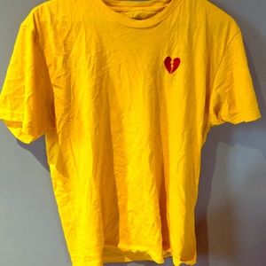 Yellow “heartless” tee
